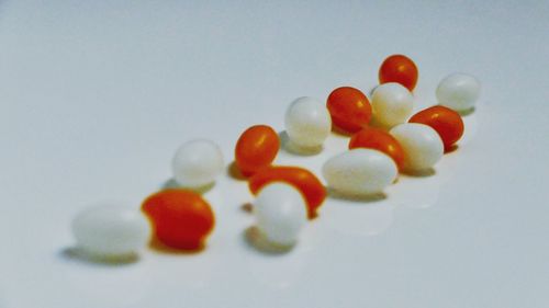 Close-up of strawberry over white background