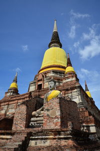 Low angle view of temple building against sky