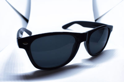 Close-up of sunglasses on table