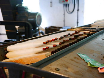 Close-up of piano on table