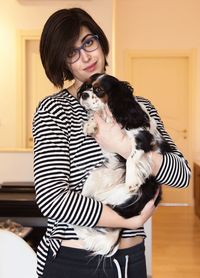 Woman with dog at home