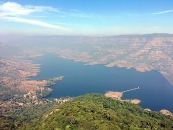 Aerial view of landscape and sea against sky