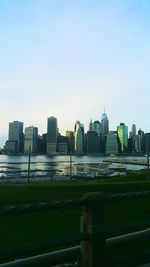 Modern cityscape against clear sky