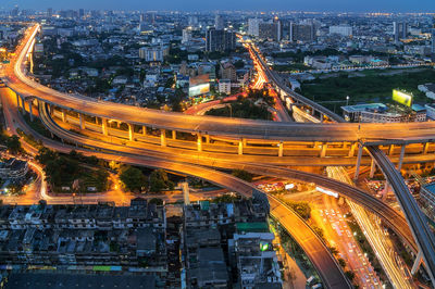 High angle view of illuminated cityscape at night