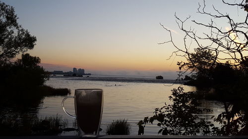 View of calm sea at sunset