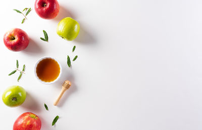 High angle view of fruits served on white background