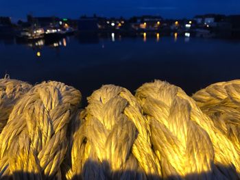 Scenic view of sea against clear sky at night
