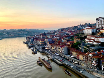 Old town porto from ponte luis i bridge.ribeira riverside along douro. sunset, golden hour. portugal