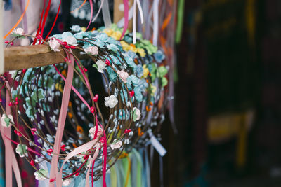 Close-up of multi colored decorations hanging at market stall