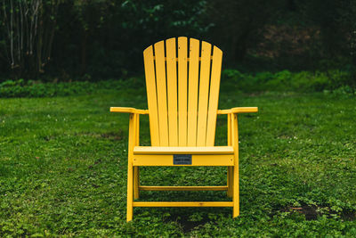 Empty chairs on field