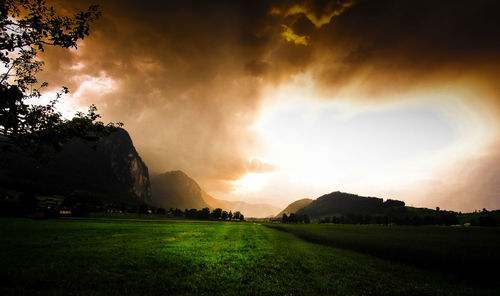 Scenic view of landscape against sky during sunset