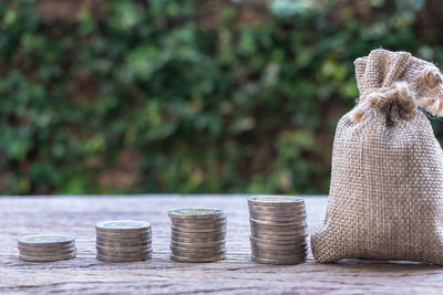 Close-up of coins on table