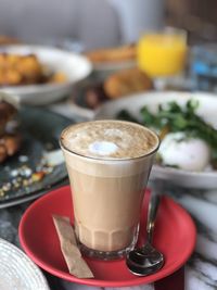 Close-up of coffee cup on table
