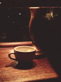 Close-up of coffee cup on table
