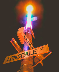 Close-up of illuminated sign board