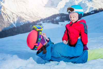 Portrait of man skiing on snow