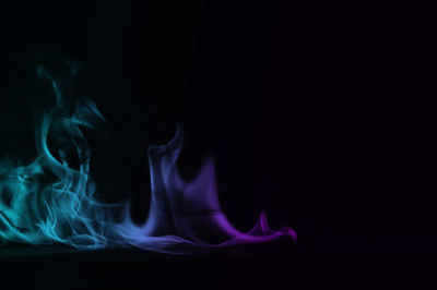 Close-up of fire against black background