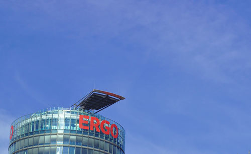 Low angle view of building against blue sky