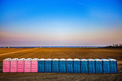 Scenic view of beach against sky during sunset