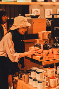 Smiling woman shopping in store