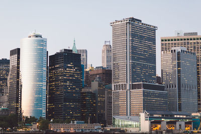 Low angle view of modern buildings against sky in city