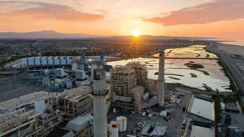 High angle view of cityscape against sky during sunset