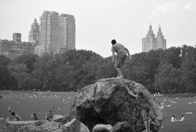 Tourist enjoying holiday in park in city
