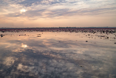 Scenic view of sea against sky at sunset