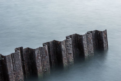 High angle view of rocks by sea