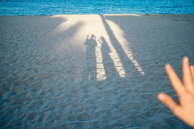 High angle view of shadow on beach