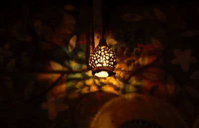 Close-up of illuminated lantern hanging at night