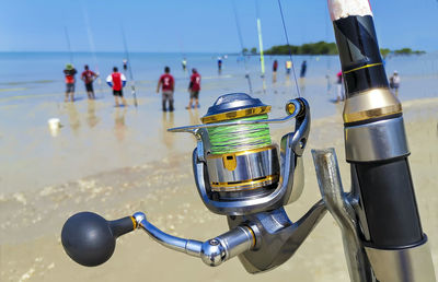 Close up. fishing rod at the beach