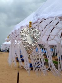 Close-up of decoration hanging on table
