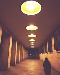Illuminated lights in corridor of building
