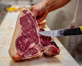 Close-up of person preparing food