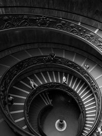 Directly below shot of spiral staircase of building