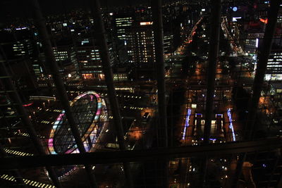 Illuminated cityscape at night