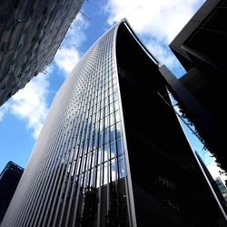 Low angle view of modern building against sky