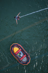 High angle view of man swimming in sea