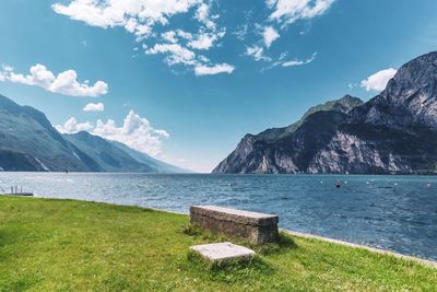 Scenic view of lake and mountains against sky