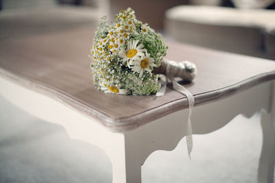 Close-up of white flowers on table