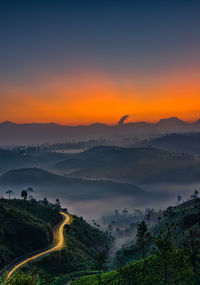 Scenic view of landscape against sky during sunset