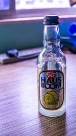 Close-up of glass bottle on table