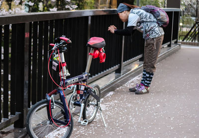 Low section of person riding bicycle