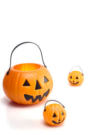 Close-up of jack o lanterns against white background