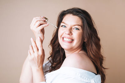 Young woman using mobile phone