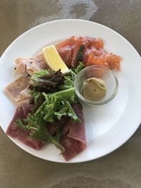 Assorted cold cut high angle view of food in plate
