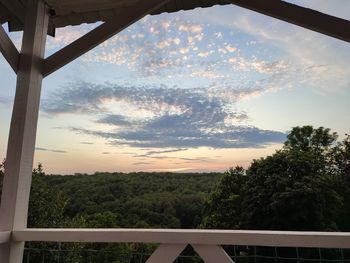 Scenic view of sunset seen through window