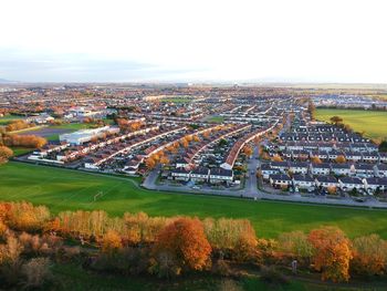 High angle view of field against sky during autumn