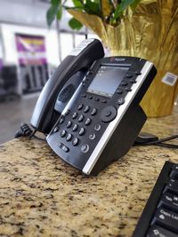 Close-up of smart phone on table